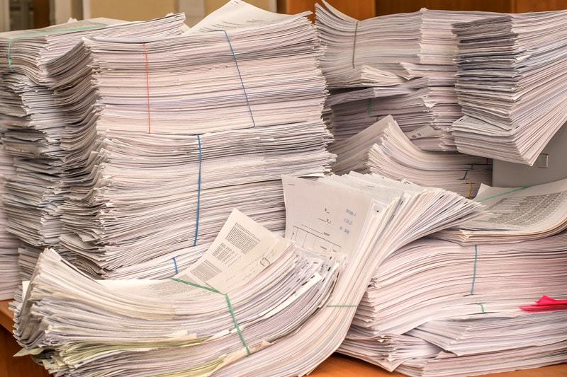workplace productivity paper piles